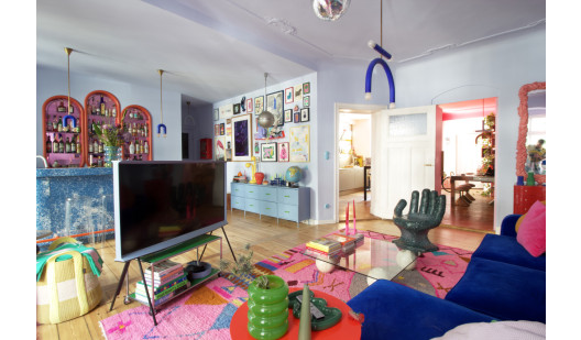 plush 74 colorful playful apartment with bar 71411 1