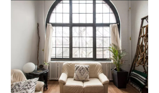 plush74 large bright loft with arched window toronto 2